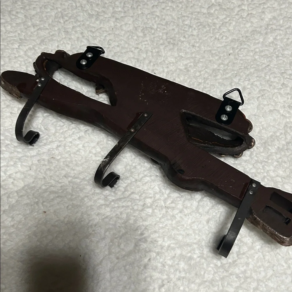 Gun belt wall hanger